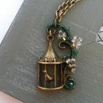 Song Bird - Antique bronze bird cage necklace